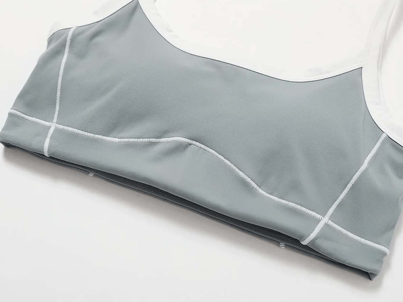 Gray push-up sports bra for yoga and fitness with spandex support, breathable and stylish design, model SF2456.